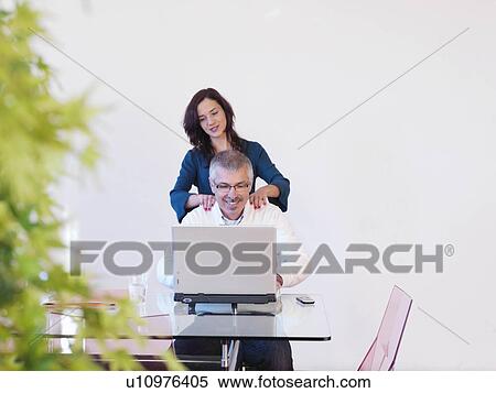 Co-workers in office View Large Photo Image Stock Photography - Co-workers in office. Fotosearch
