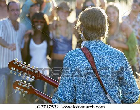 Concert in a field View Large Photo Image Stock Image - Concert in a field. Fotosearch