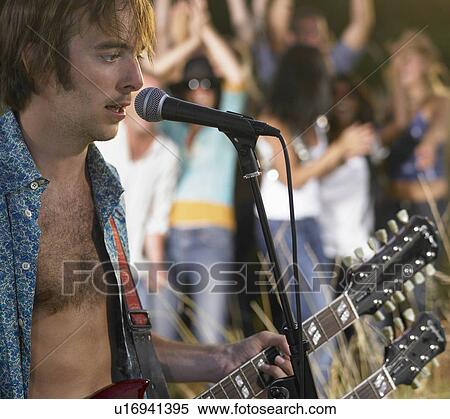 Concert in a field View Large Photo Image Stock Photography - Concert in a field. Fotosearch