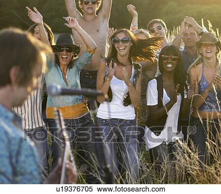 Concert in a field View Large Photo Image Stock Photography - Concert in a field. Fotosearch