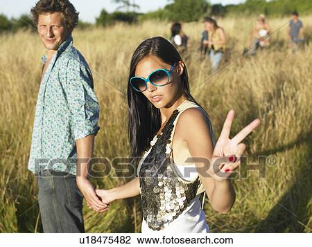Couple at a festival View Large Photo Image Stock Image - Couple at a festival. Fotosearch