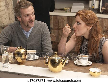 Stock Image - Couple having tea in café. Fotosearch