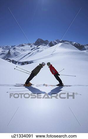 Couple standing in mountain landscape View Large Photo Image Stock Image - Couple standing in mountain landscape. Fotosearch