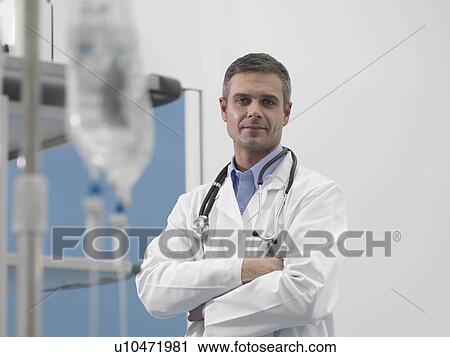 Stock Image - Doctor in hospital environment. Fotosearch