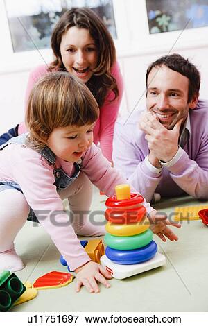 Family playing together View Large Photo Image Stock Photo - Family playing together. Fotosearch