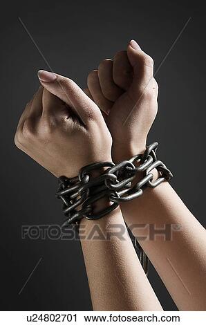 Female hands chained together View Large Photo Image Stock Image - Female hands chained together. Fotosearch