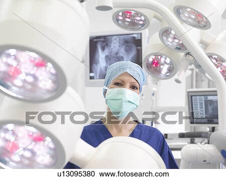 Female nurse in operating theatre View Large Photo Image Stock Image - Female nurse in operating theatre. Fotosearch