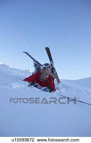 Female skier fallen over View Large Photo Image Stock Image - Female skier fallen over. Fotosearch
