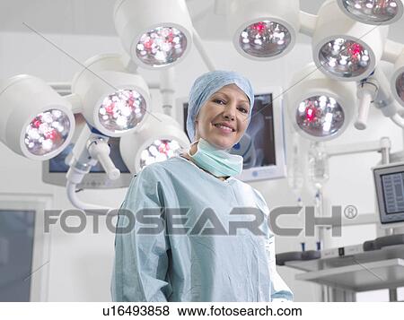 Stock Photo - Female surgeon in operating theatre. Fotosearch