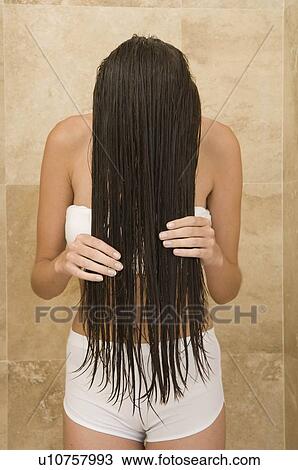 Female washing hair View Large Photo Image Stock Image - Female washing hair. Fotosearch