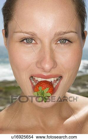 Female with fruit View Large Photo Image Picture - Female with fruit. Fotosearch