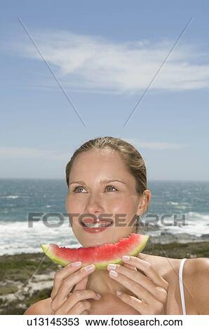 Female with fruit View Large Photo Image Stock Image - Female with fruit. Fotosearch