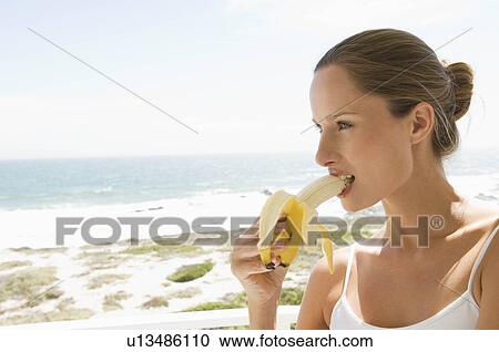 Female with fruit View Large Photo Image Stock Image - Female with fruit. Fotosearch