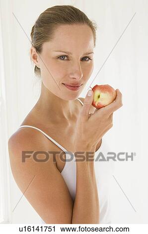Female with fruit View Large Photo Image Stock Image - Female with fruit. Fotosearch