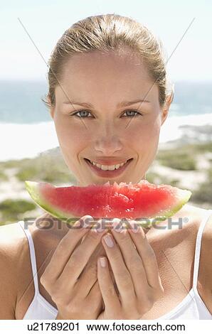 Female with fruit View Large Photo Image Stock Image - Female with fruit. Fotosearch