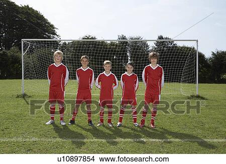 Football Team in front of goal View Large Photo Image Picture - Football Team in front of goal. Fotosearch