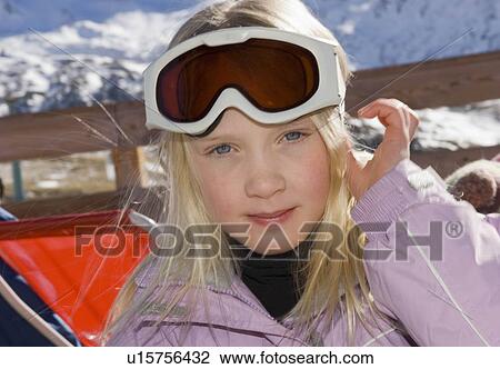 Girl looking to camera wearing goggles View Large Photo Image Stock Image - Girl looking to camera wearing goggles. Fotosearch