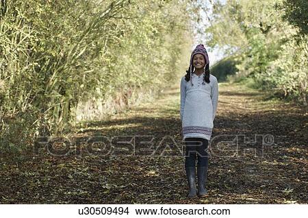Picture - Girl on country lane. Fotosearch