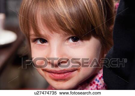 Girl with chocolate around mouth View Large Photo Image Stock Photography - Girl with chocolate around mouth. Fotosearch
