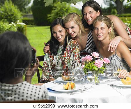 Girlfriends posing for the picture View Large Photo Image Stock Photo - Girlfriends posing for the picture. Fotosearch