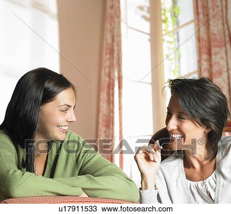 Girlfriends smiling View Large Photo Image Stock Image - Girlfriends smiling. Fotosearch