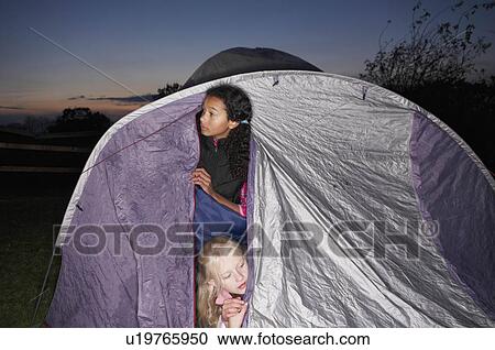 Girls in sleeping bags at dusk View Large Photo Image Stock Image - Girls in sleeping bags at dusk. Fotosearch
