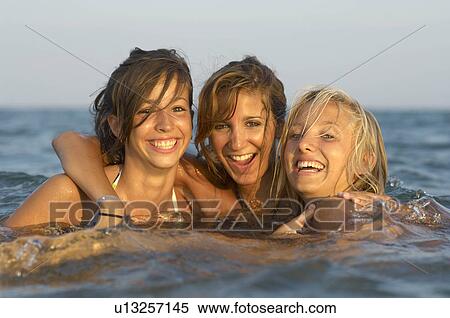 Girls teenagers playing in the sea View Large Photo Image Stock Photography - Girls teenagers playing in the sea. Fotosearch