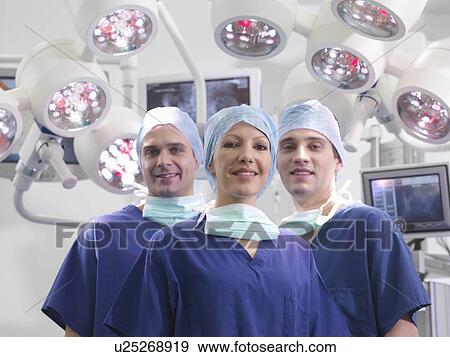 Stock Photo - Group of nurses in operating theatre. Fotosearch