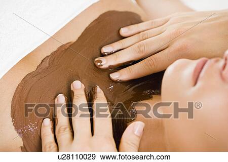 Hands massaging cleavage View Large Photo Image Stock Photo - Hands massaging cleavage. Fotosearch