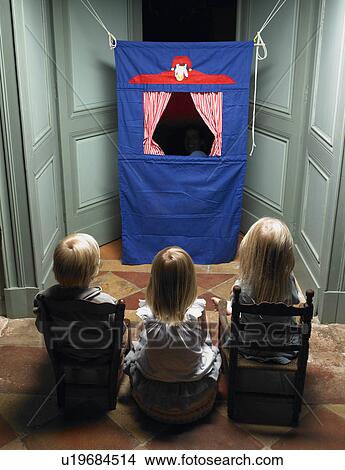 Picture - Kids watching a puppet show. Fotosearch