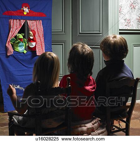 Kids watching a puppet show View Large Photo Image Stock Photography - Kids watching a puppet show. Fotosearch