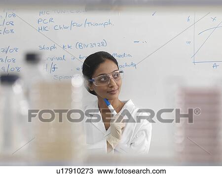 Laboratory technician and whiteboard View Large Photo Image Stock Image - Laboratory technician and whiteboard. Fotosearch