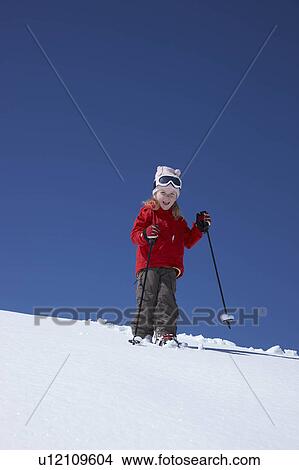 Little girl skiing on mountain View Large Photo Image Picture - Little girl skiing on mountain. Fotosearch