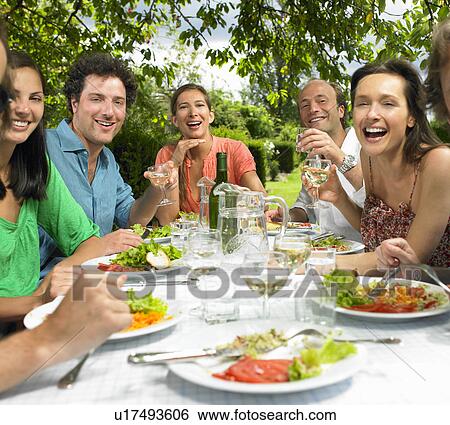 Stock Photograph - Lunch in the garden. Fotosearch