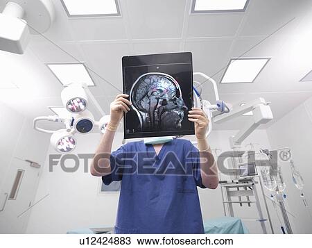 Male nurse with x-ray View Large Photo Image Stock Image - Male nurse with x-ray. Fotosearch