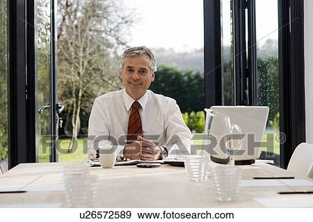 Stock Photo - Man at work. Fotosearch