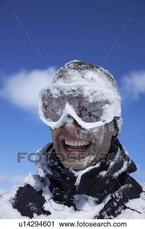 "Man laughing, face covered with snow" View Large Photo Image Stock Image - "Man laughing, face covered with snow". Fotosearch