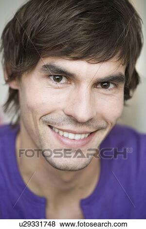 Stock Photo - Man looking at viewer. Fotosearch