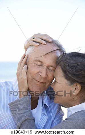 Mature couple close together View Large Photo Image Stock Photo - Mature couple close together. Fotosearch