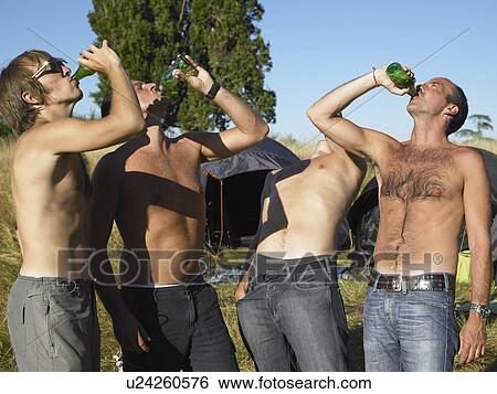 Stock Photograph - Men drinking beer at a festival. Fotosearch