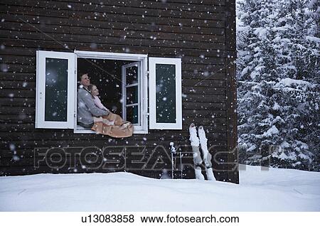 Mother and daughter sitting in window View Large Photo Image Stock Photo - Mother and daughter sitting in window. Fotosearch