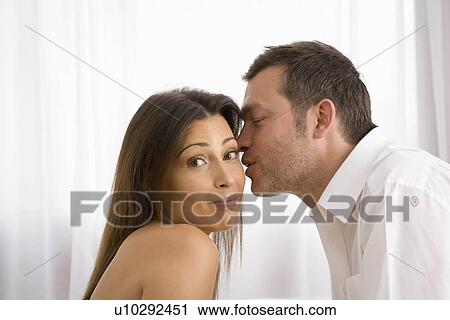 Natural image of young couple at home View Large Photo Image Stock Image - Natural image of young couple at home. Fotosearch