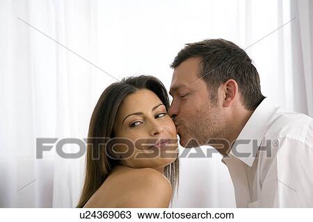 Natural image of young couple at home View Large Photo Image Stock Image - Natural image of young couple at home. Fotosearch