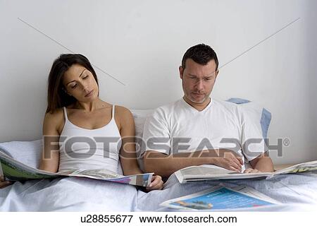 Natural image of young couple at home View Large Photo Image Stock Photo - Natural image of young couple at home. Fotosearch