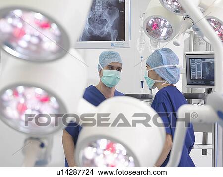 Nurses in operating theatre View Large Photo Image Picture - Nurses in operating theatre. Fotosearch