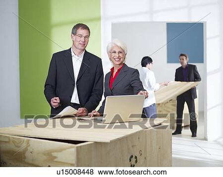 Office team moving in View Large Photo Image Stock Photo - Office team moving in. Fotosearch