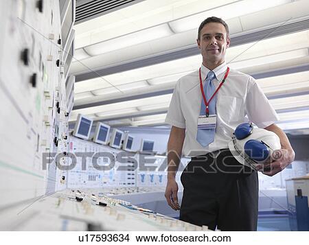 Picture - Operator with safety helmet. Fotosearch