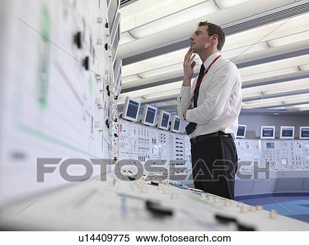 Operator working in control room View Large Photo Image Stock Photography - Operator working in control room. Fotosearch