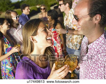 People having drinks at sunset View Large Photo Image Stock Image - People having drinks at sunset. Fotosearch
