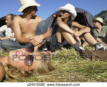 "People in a field, backpacking tents" View Large Photo Image Stock Image - "People in a field, backpacking tents". Fotosearch